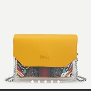 Chain shoulder bag with transparent contrast flap